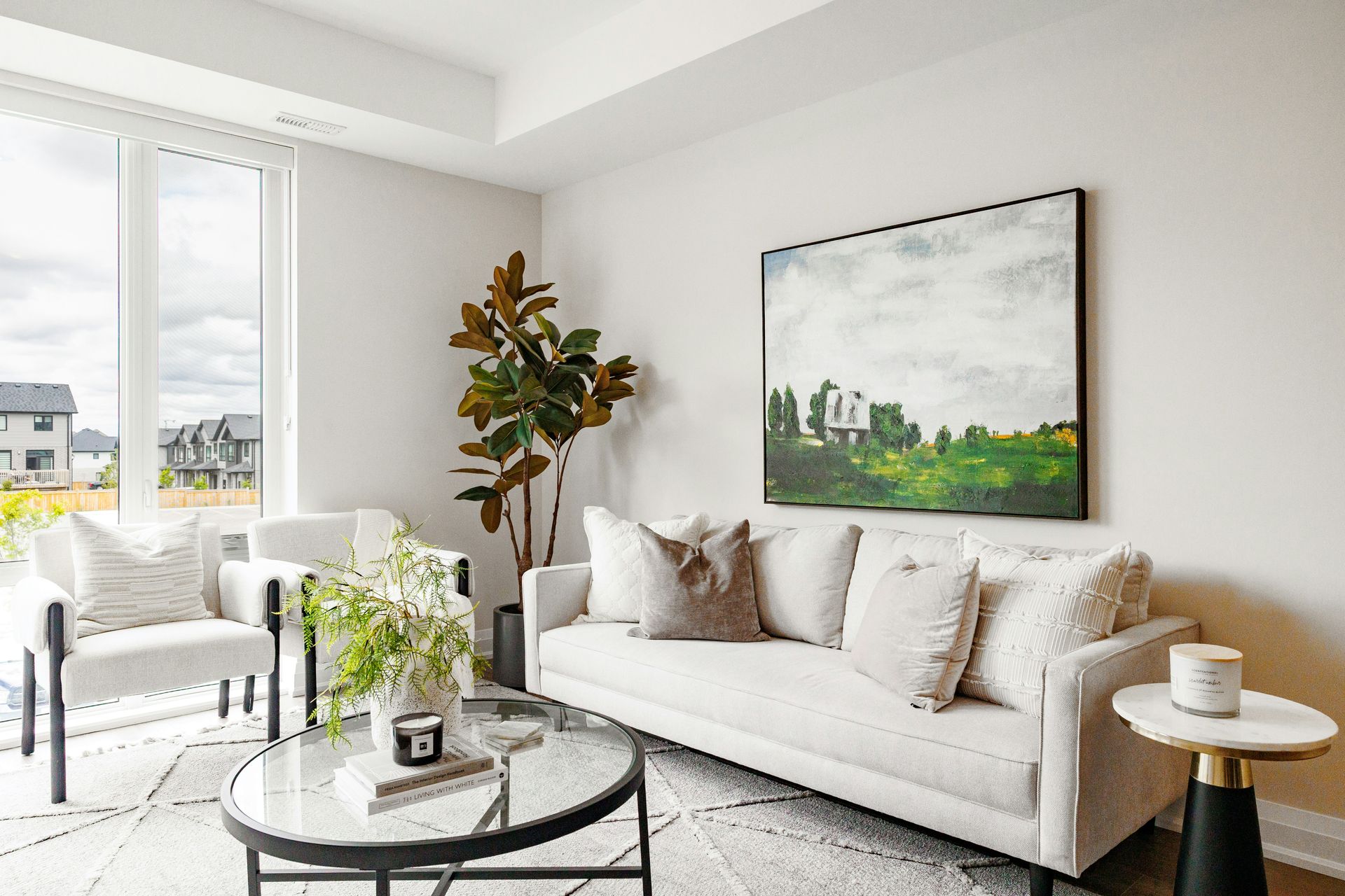 Modern living room with white sofa and artwork